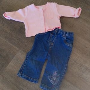Jeans with pastel pink sweater